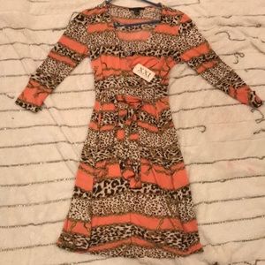 Cheetah print and chain design on orange dress
